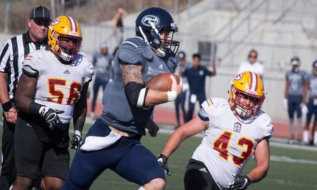QB Kane Wilson scores one of his three TDs against the Gauchos of Saddleback College.