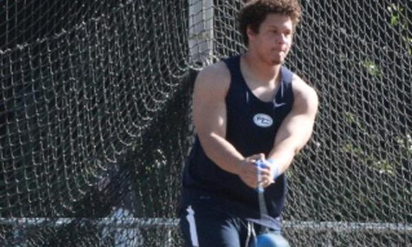 MEN'S TRACK & FIELD: WORD TAKES 1ST IN DISCUSS