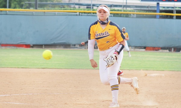 SOFTBALL: SPLITTING WITH THE DONS