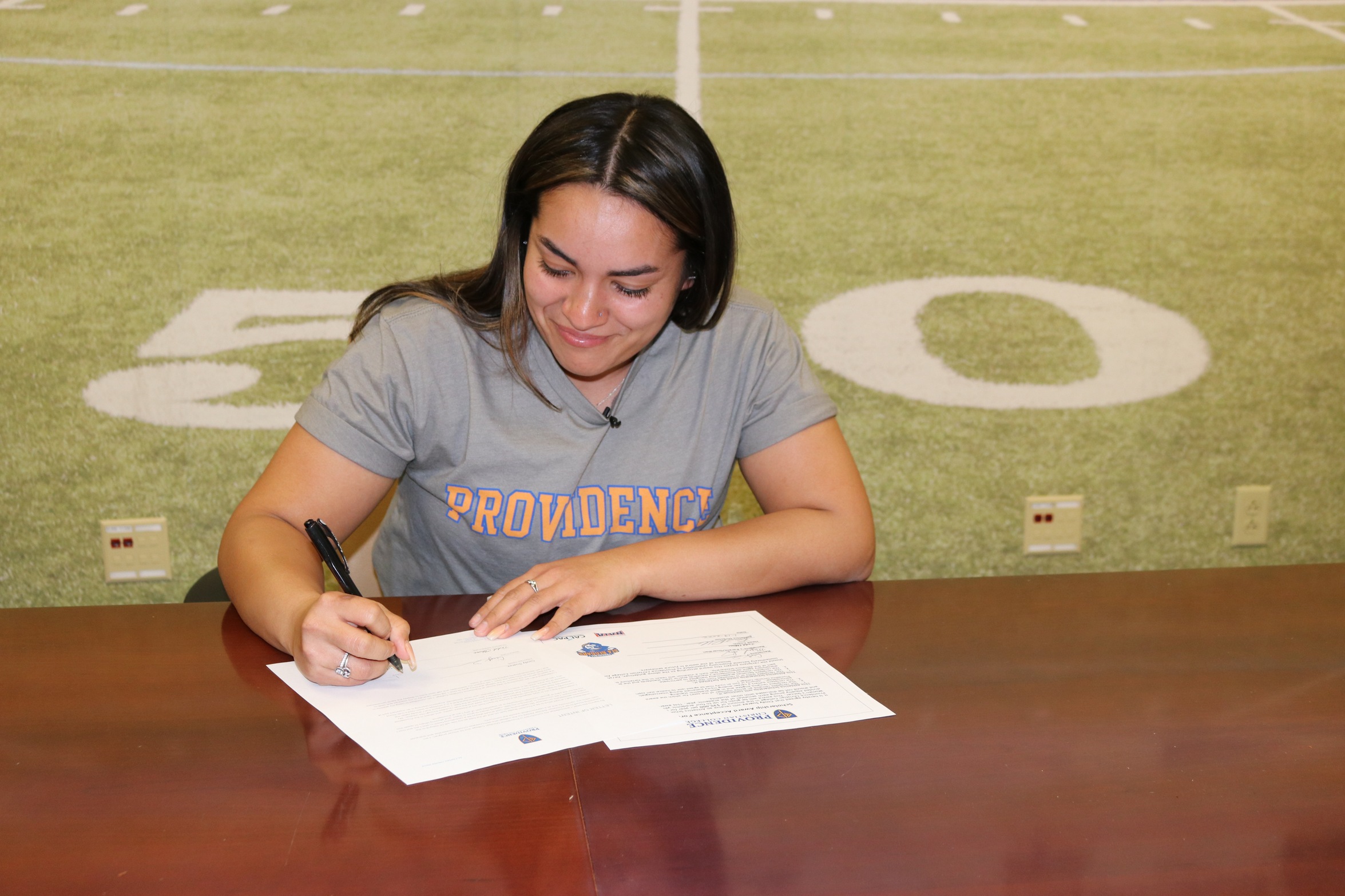 Cindy Suarez signs her letter of intent.